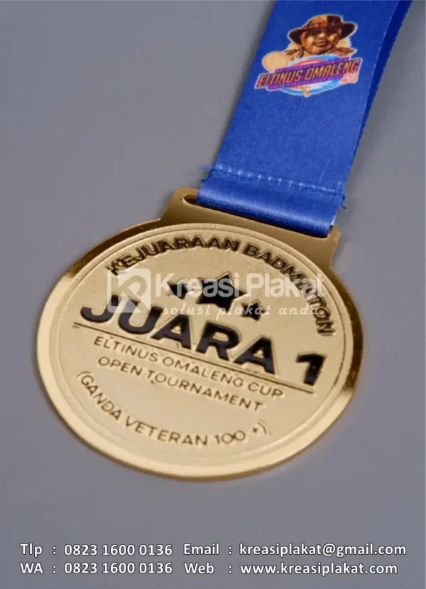 Detail Medali Juara Kejuaraan Badminton Eltinus Omaleng Cup
