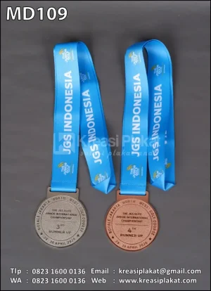 Medali Logam The J...